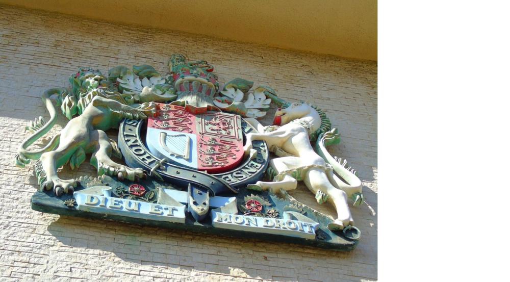 Royal crest on wall