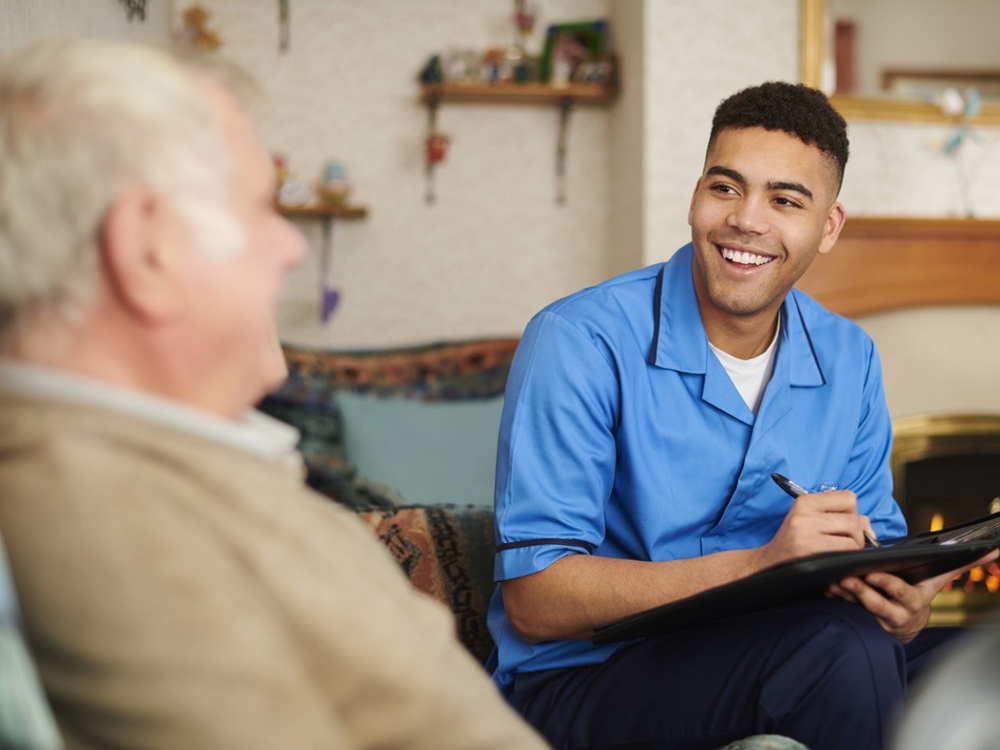 Male carer with senior man