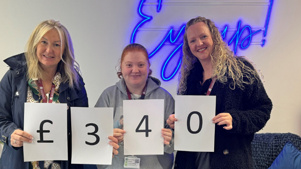 Members of Barnsley Youth Justice Service, (L-R) Dee Bailey, Beth Brooke, Gemma Pilley, displaying the fantastic amount raised to help people living with cancer