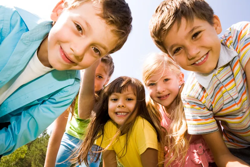 Group of 5 children smiling