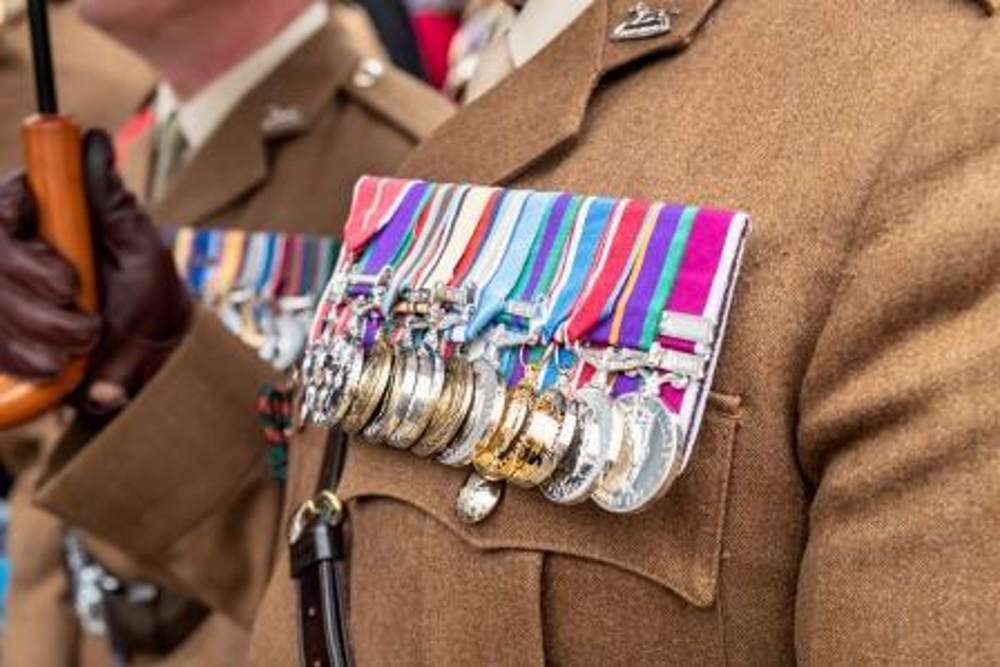 Ex serviceman wearing badges