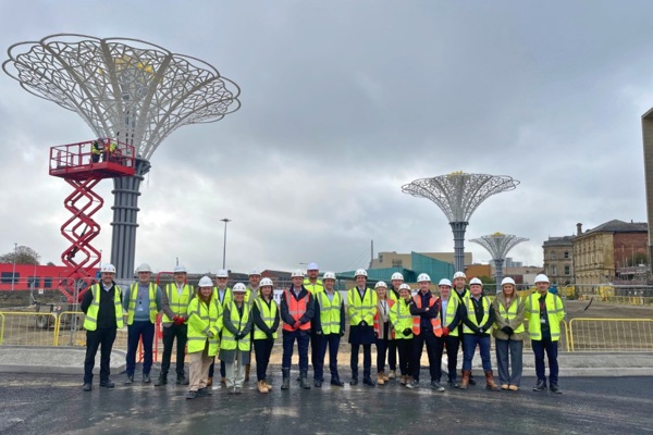 Group of people next to new Yorkshire rose sculptures
