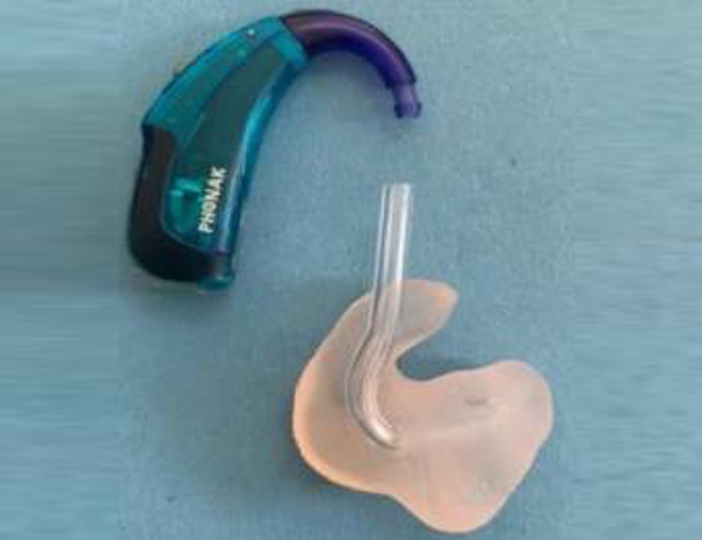 Step 1 - Carefully pull the tubing and ear hook apart