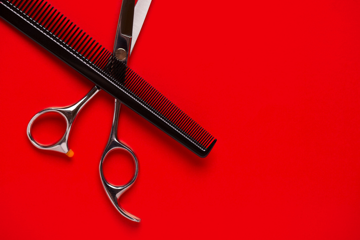 Photo of hairdresser's comb and scissors