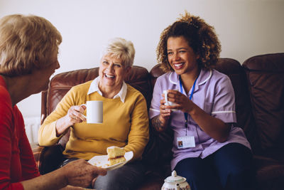 Care worker and two residents of a care home