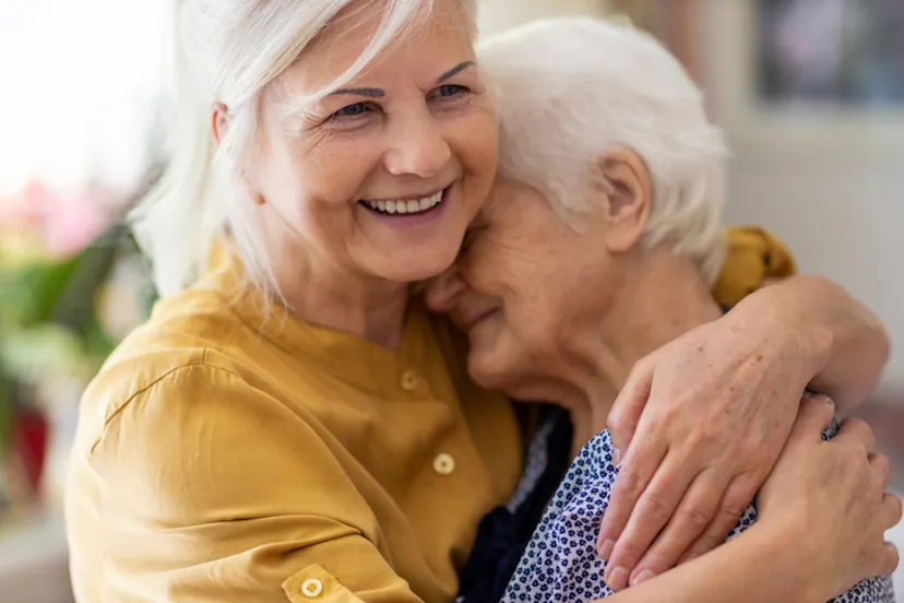 Woman hugging mother
