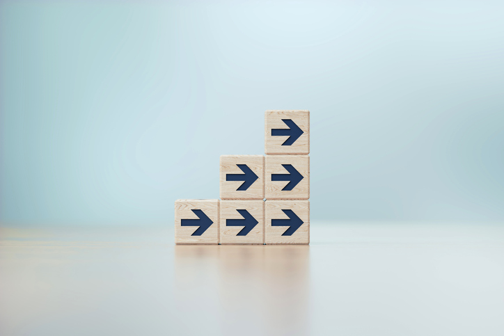 Wooden blocks with arrows