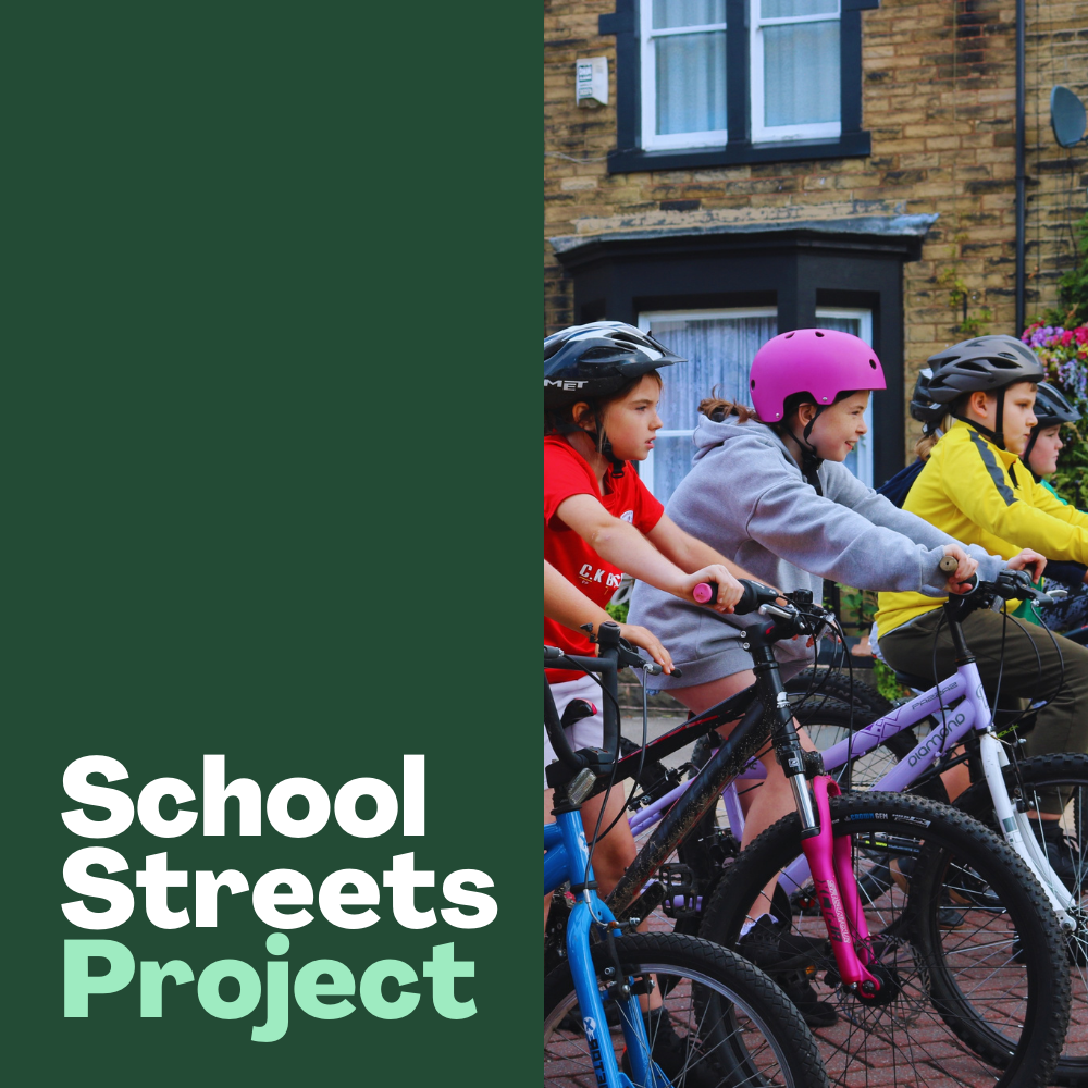 Children on their bikes and School Streets Project logo