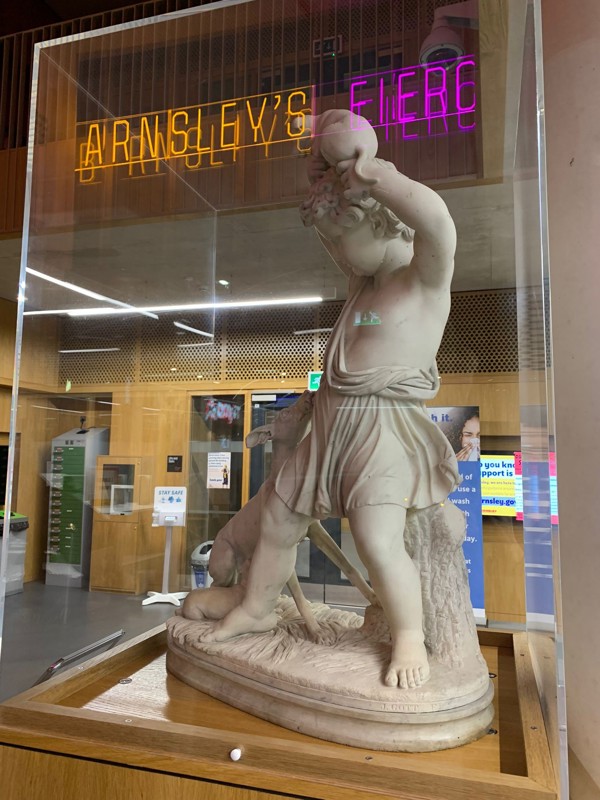 Sculpture of 'A boy with a dog' pictured in the library