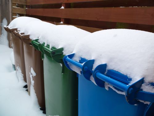 Recycling bins with snow