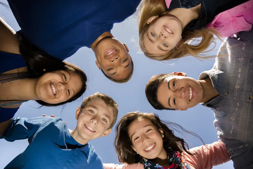 Group of teenagers in circle