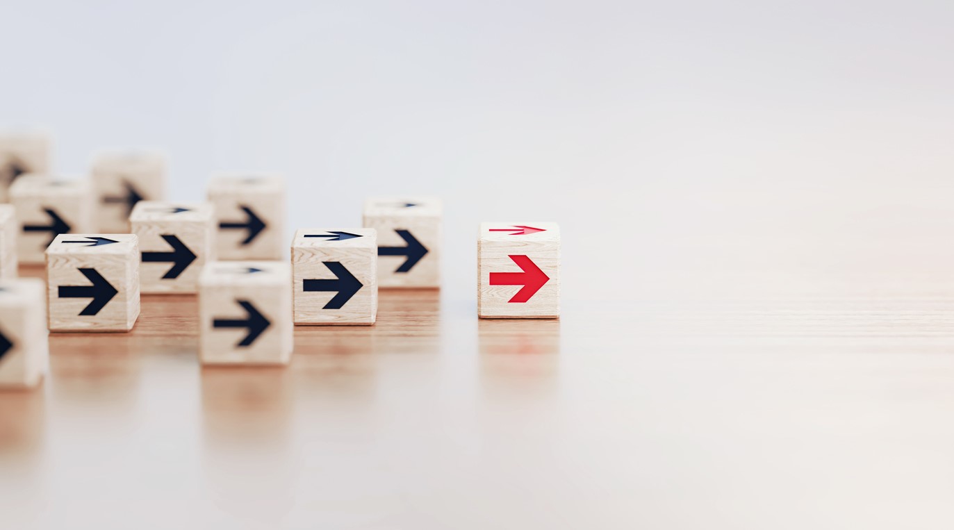 Wooden blocks with arrows on