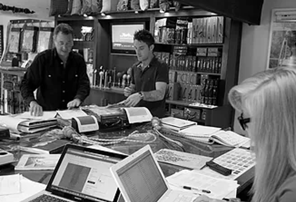 Workers in carpet shop