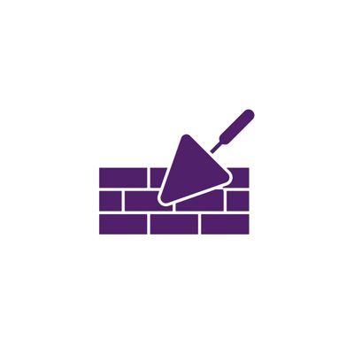 Trowel and brick wall