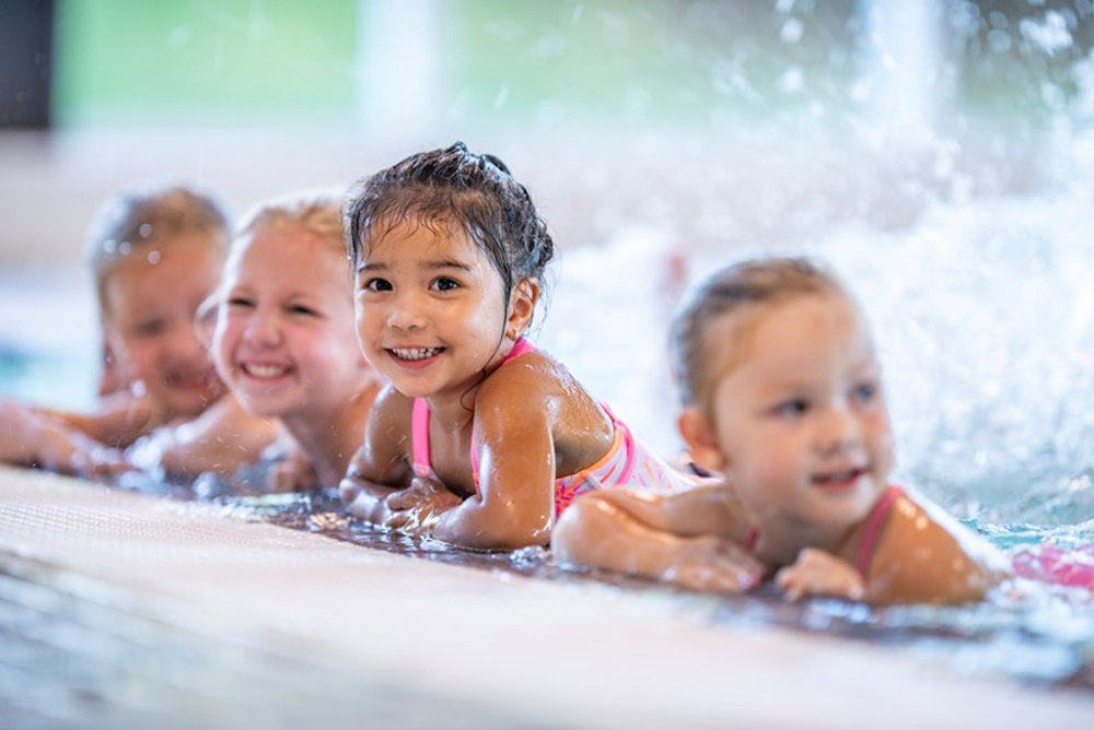 Little girls on poolside