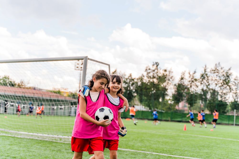 Two girls with a football