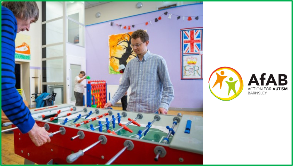 Action for Autism Barnsley - 2 men playing table football