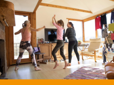 People dancing in the living room