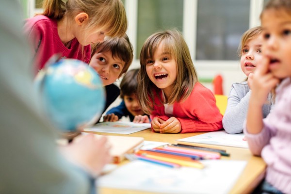 Children playing at a table