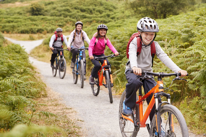 Family on mountain bikes