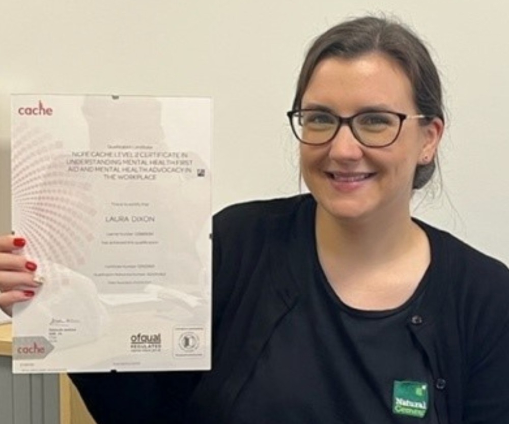 Laura with her certificate