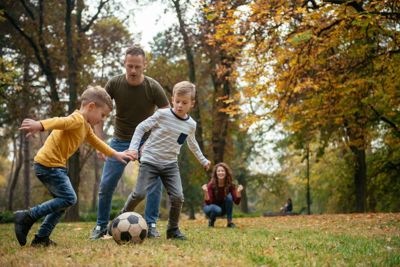 Family playing football