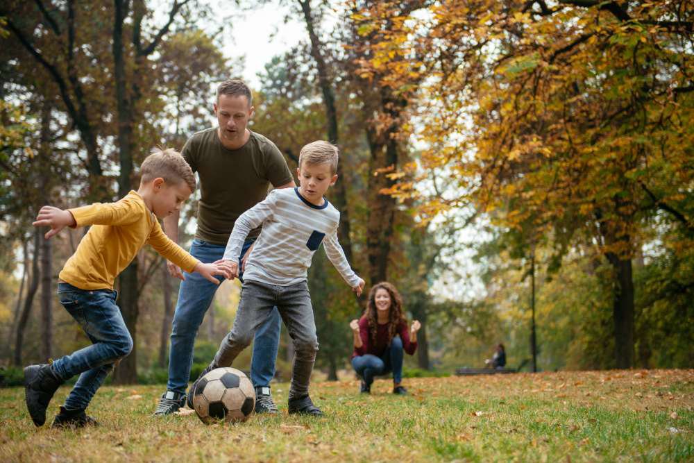 Family playing football