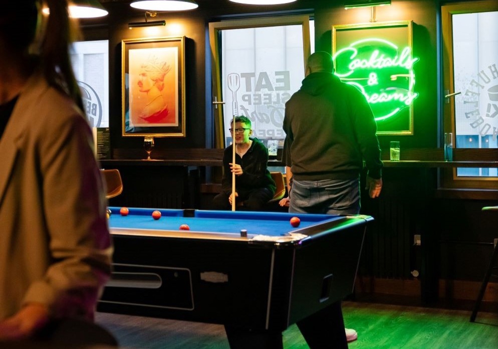 People playing pool