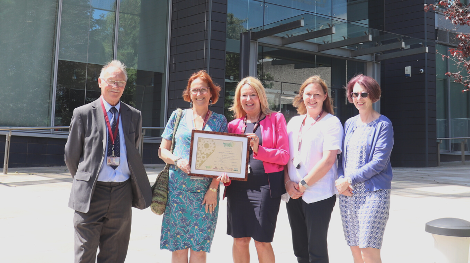 Staff outside Westgate with the Be Well @ Work award