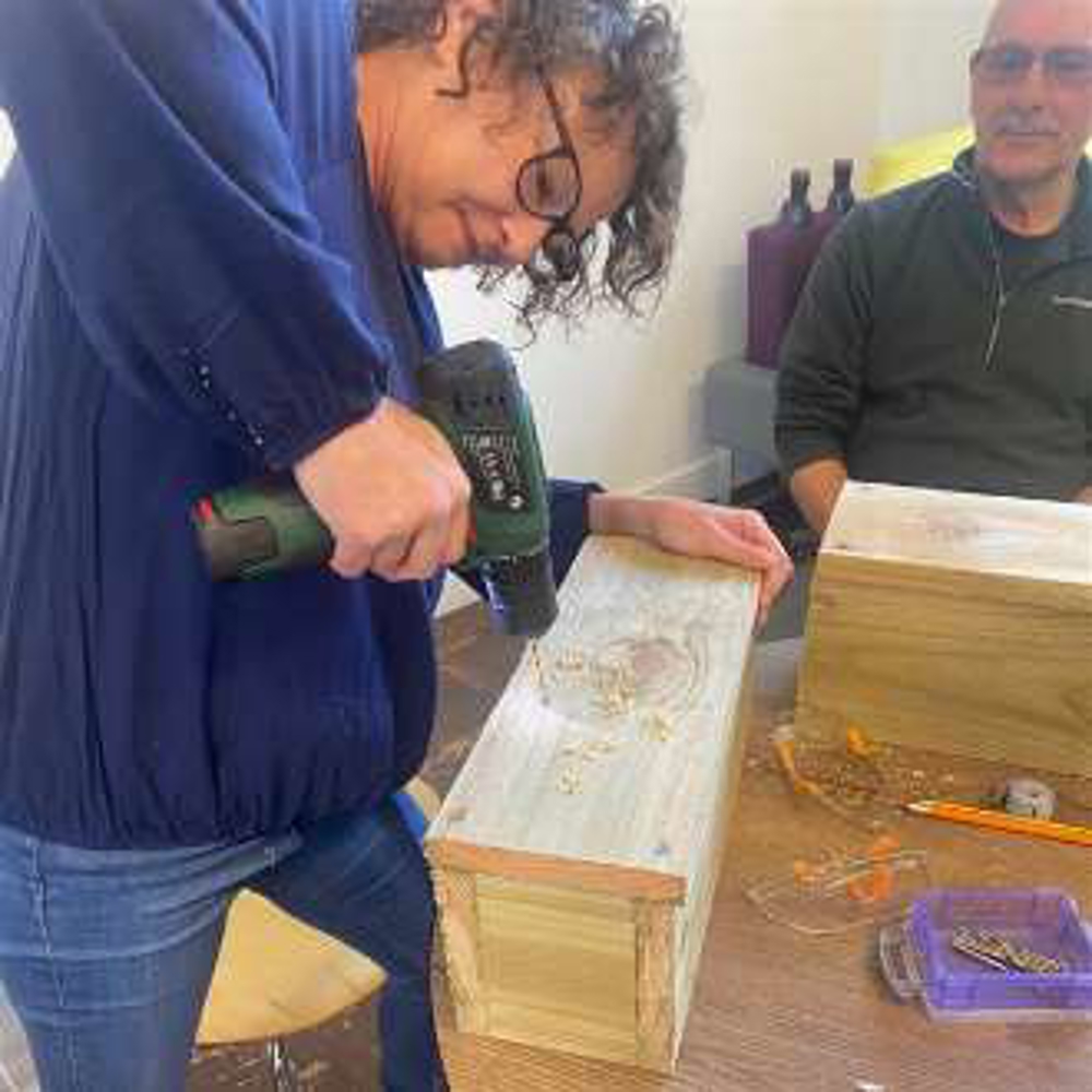 woman using a drill