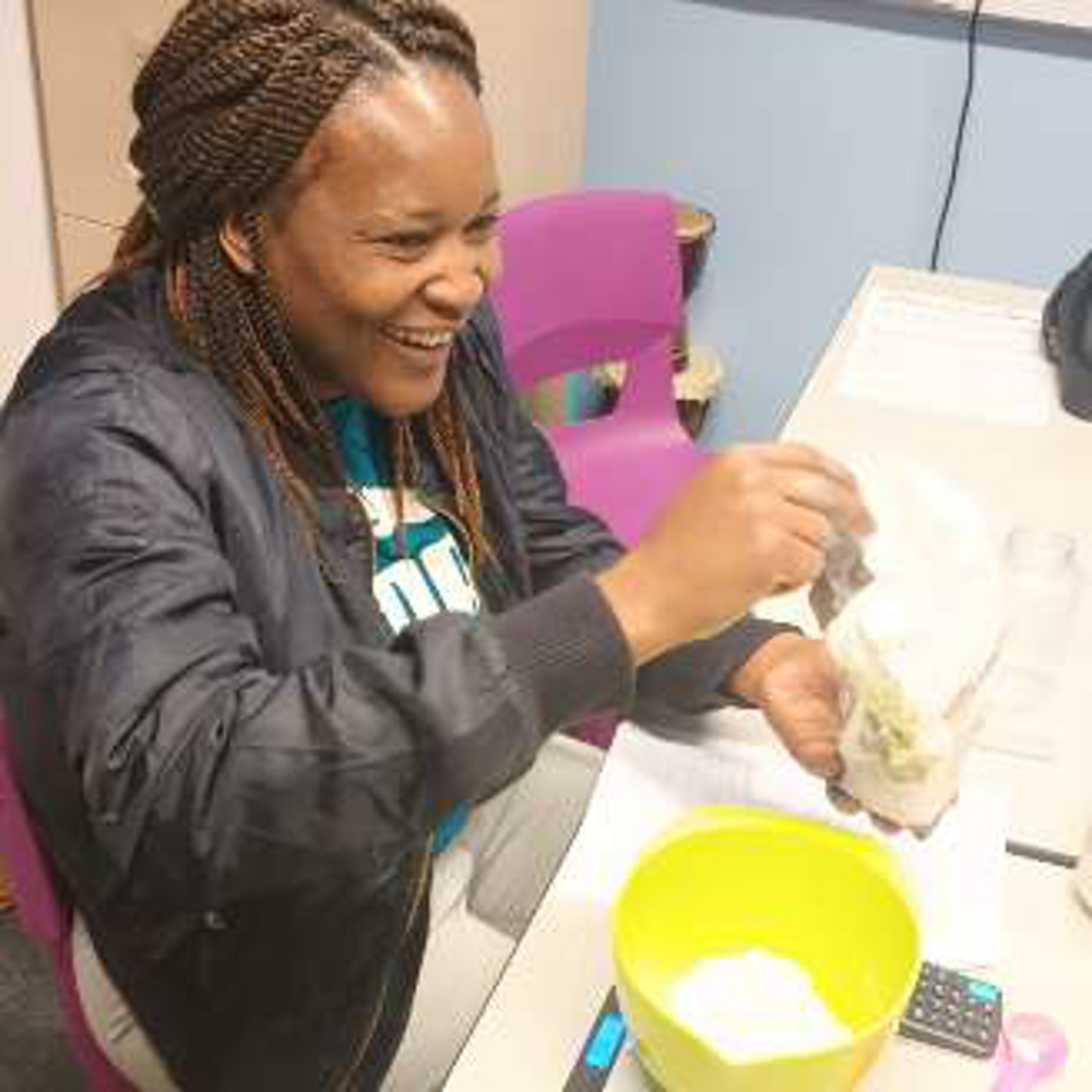 woman measuring ingredients