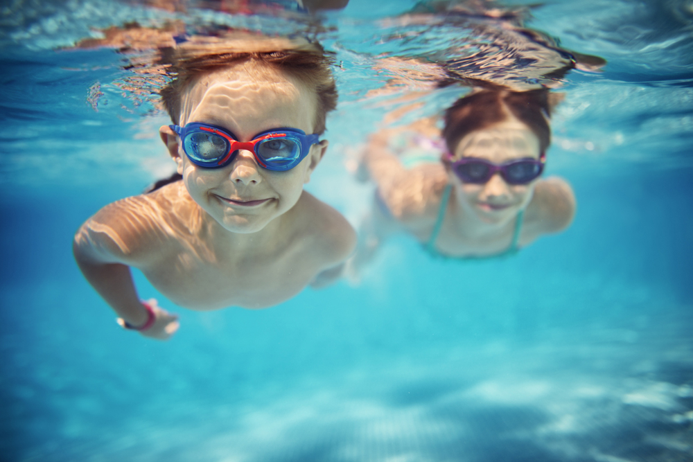 Children swimming under water