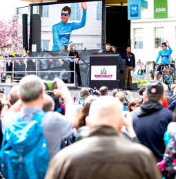 Rider introductions on stage at the race start