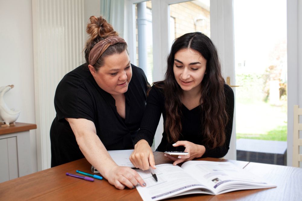 Foster Carer And Teenage Girl