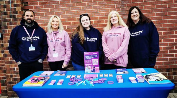 Foster Carers Amy And Stephen With Members Of Our Fostering Team