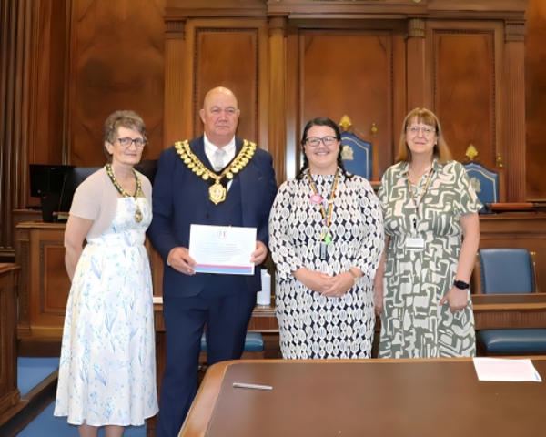 Photo Of Libraries Service Being Awarded Their Libraries Of Sanctuary Award