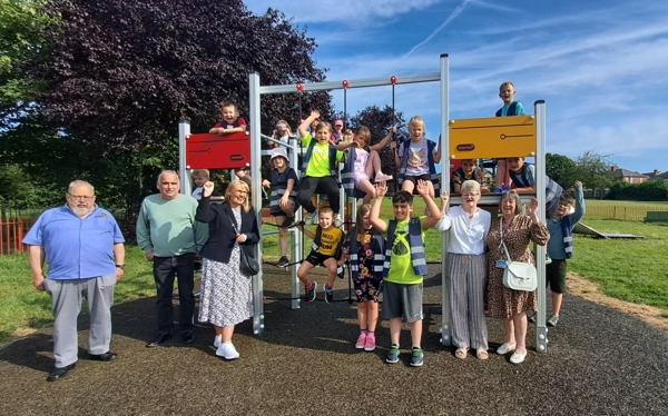 Children On A Playframe Councillors And Park Volunteers Cheer To Celebrate New Play Equipment At Royston Park