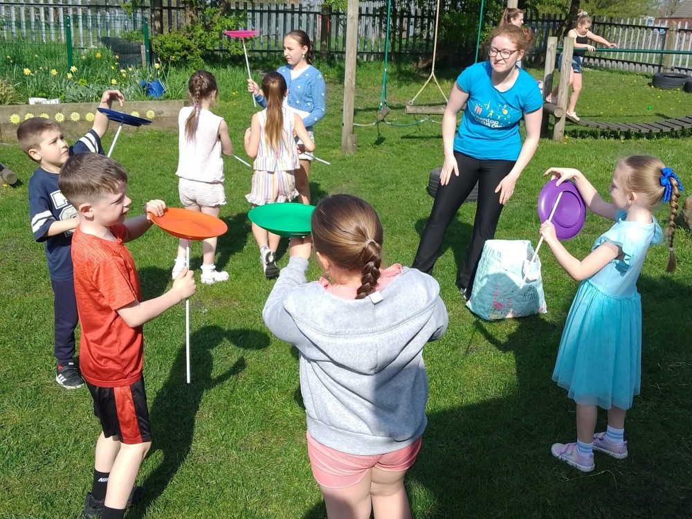 Children spinning plates