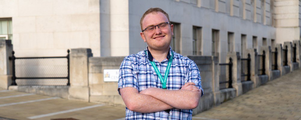 Young worker outside Town Hall