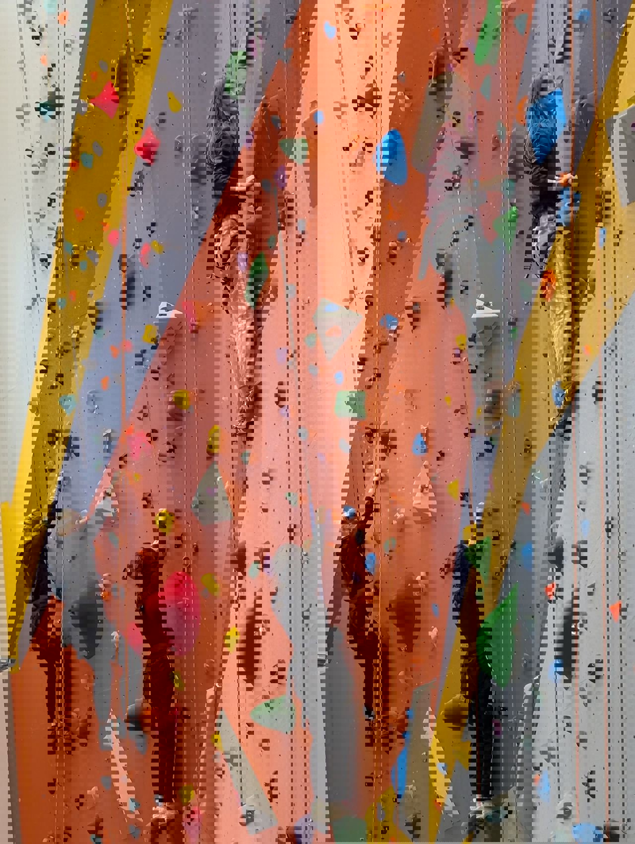 Girls on climbing wall at Base 71