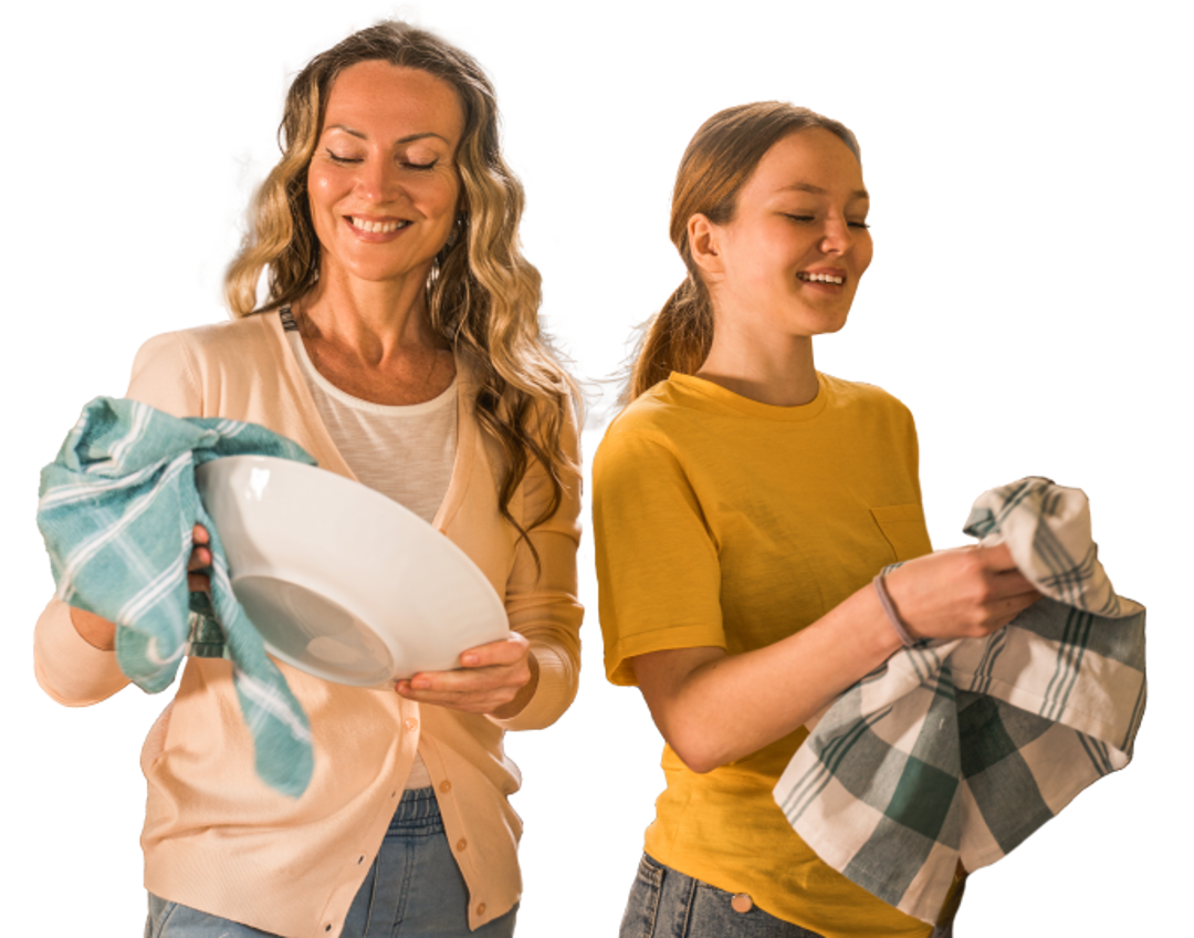 woman and girl washing the dishes