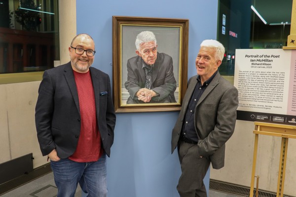 Richard Kitson and Ian Mcmillan next to the new richard's artwork at Library @ the Lightbox