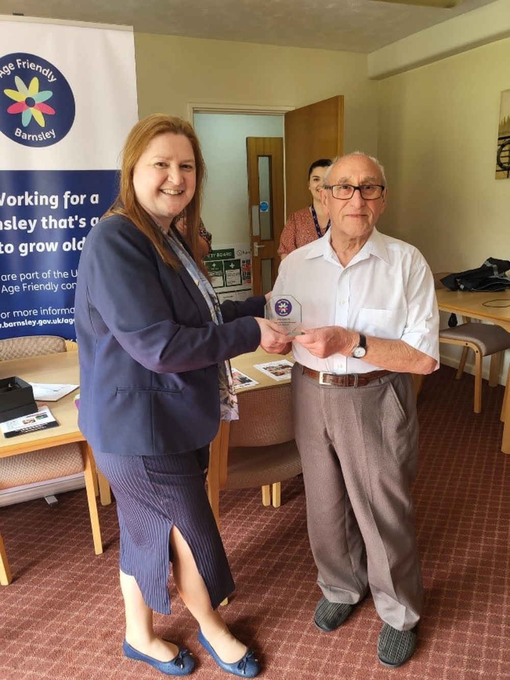 Ron Mellor being presented with the Age Friendly Community Award