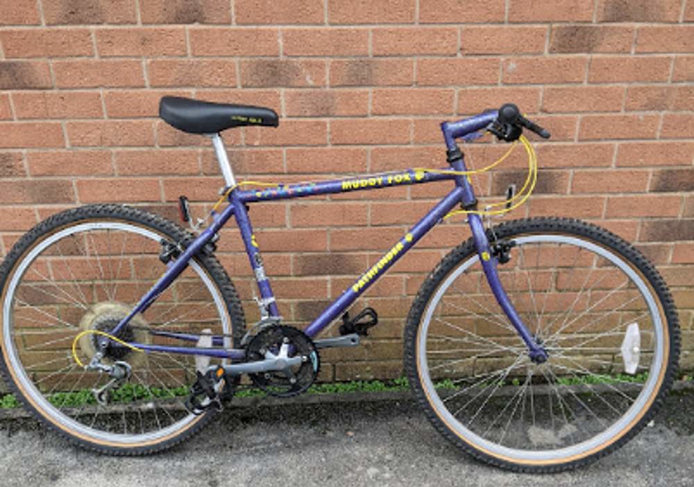 Bike Leaning Against A Wall