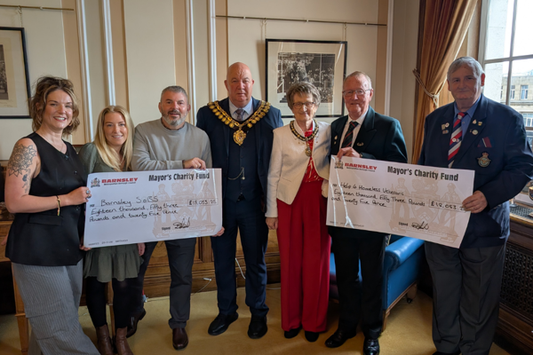 The Mayor and Mayoress of Barnsley with representatives from the charities at the cheque presentation..png