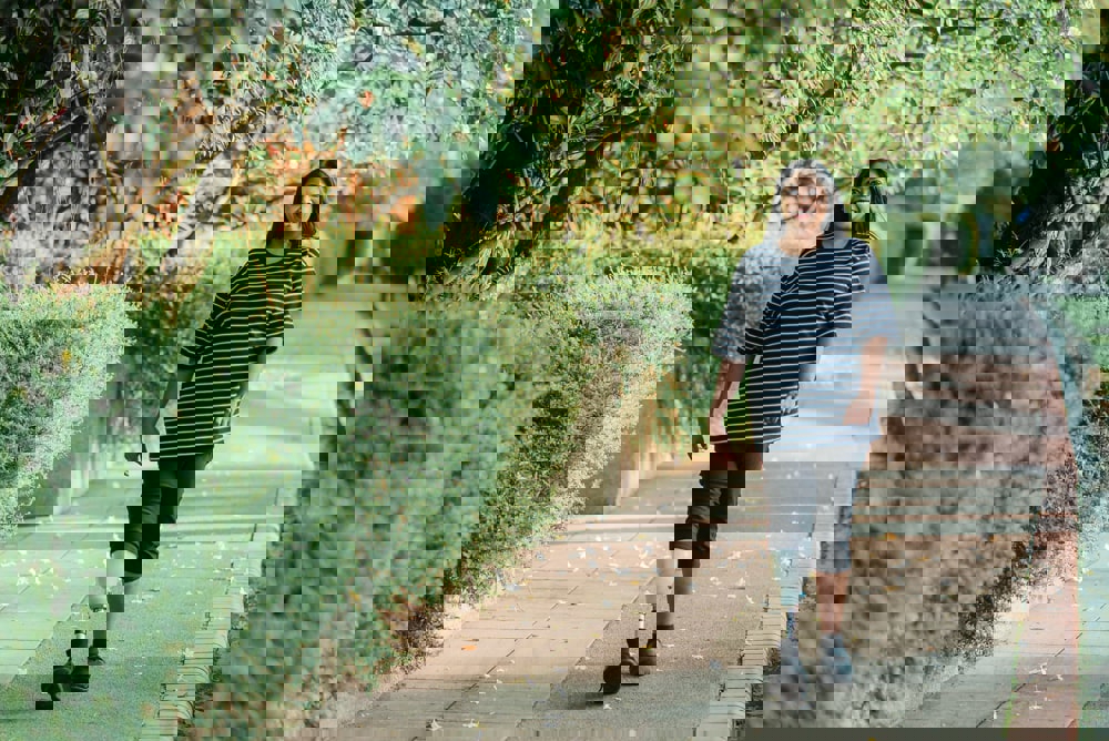 Women walking with a prosthetic leg