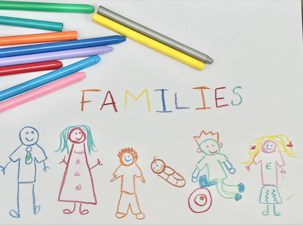 Drawing of a family in crayons